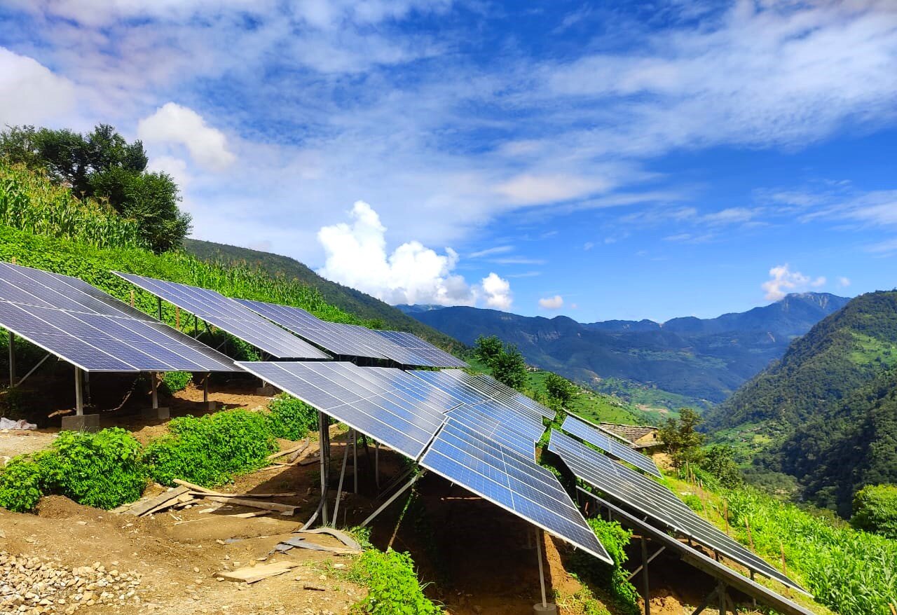 Solar array overlooking the terraced valley at Thatichaur