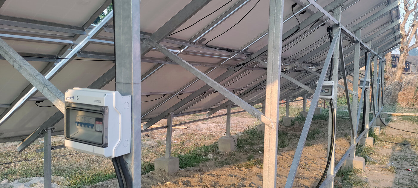 PV combiner box under the solar array